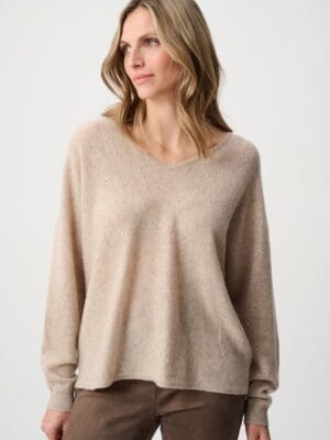 PULL SURDIMENSIONNE AVEC ORNEMENTS BEIGE