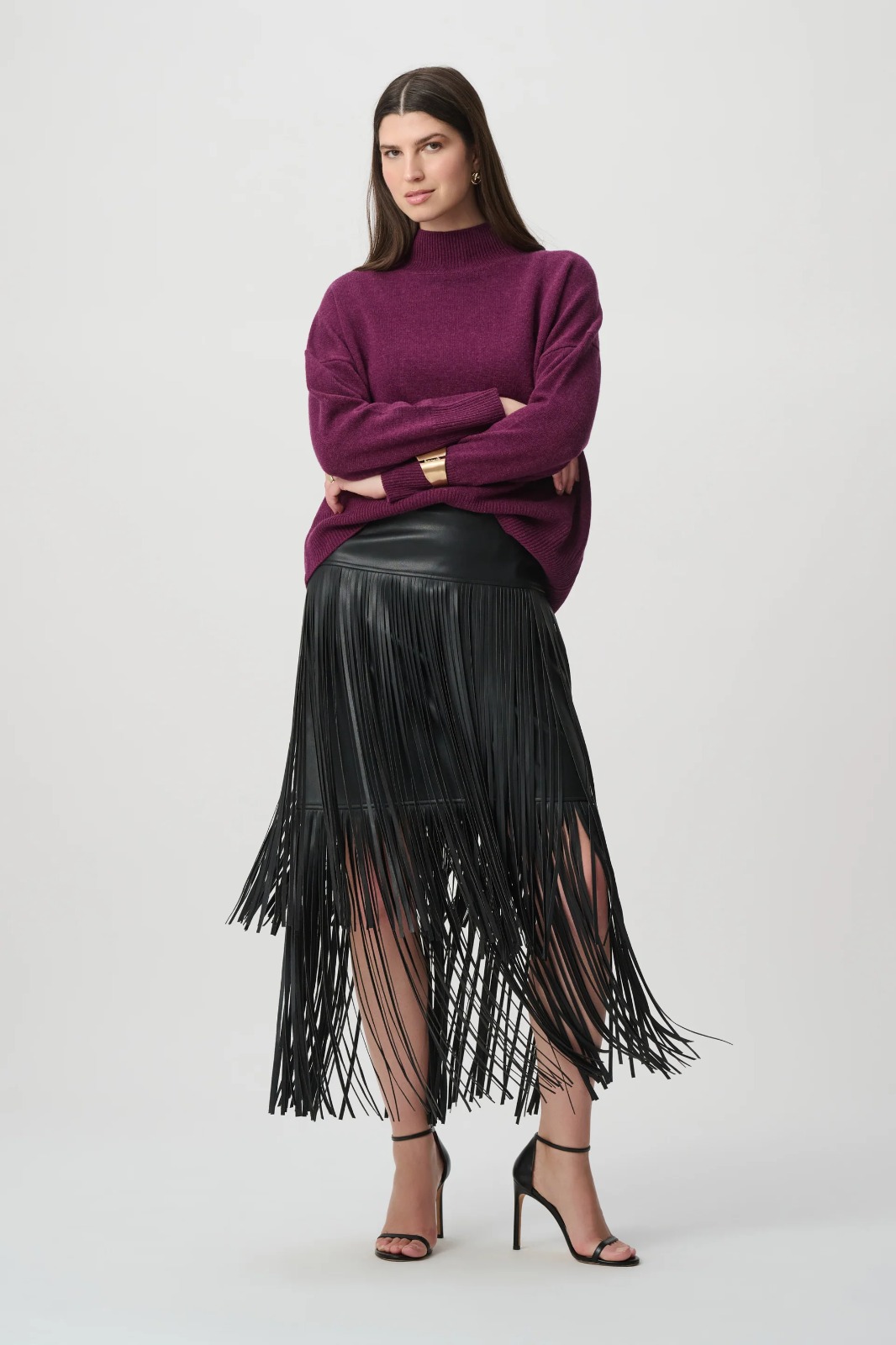 JUPE A FRANGES EN FAUX CUIR NOIRE